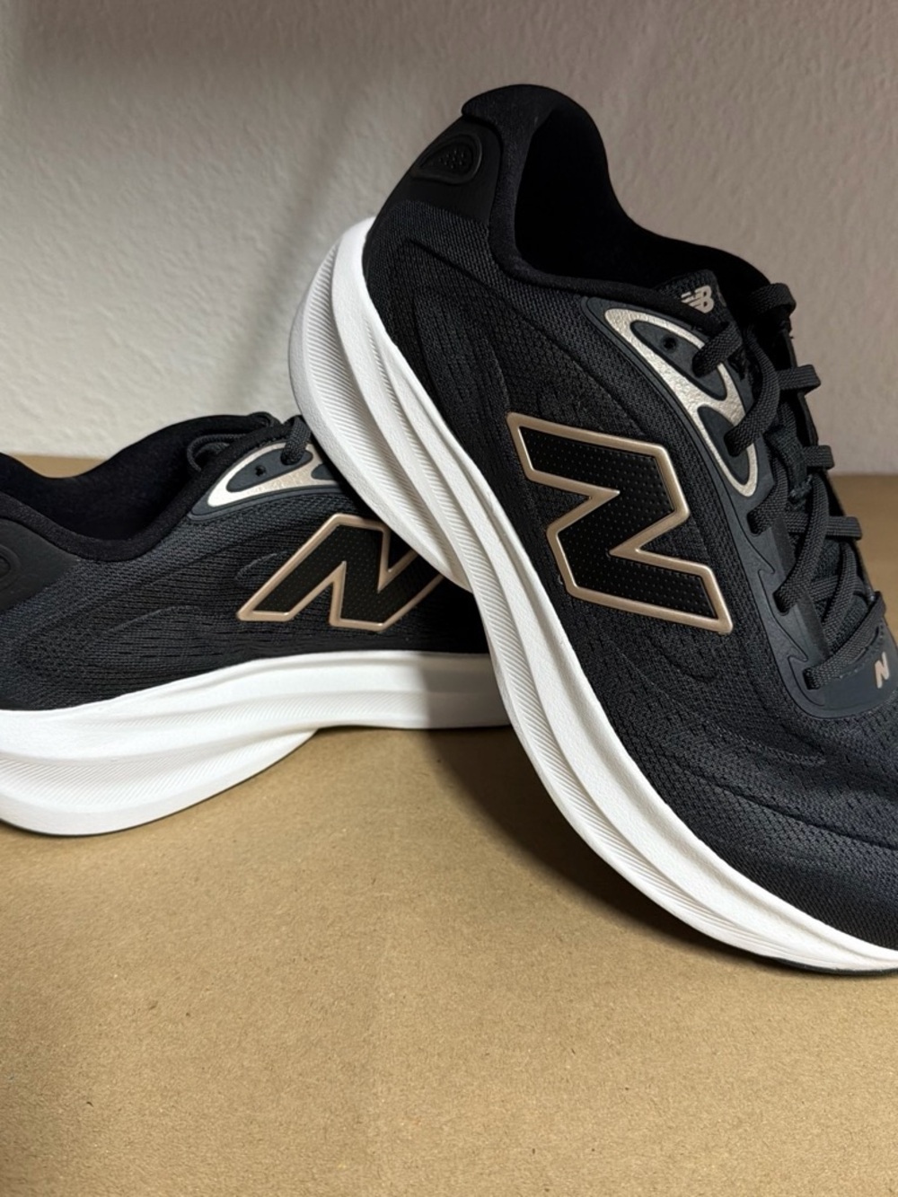 New Balance Women’s Black Athletic Sneakers with White Midsoles